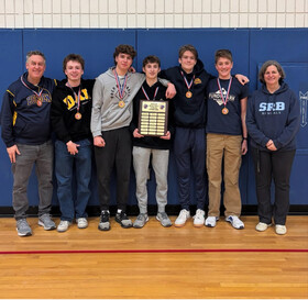 boys with their trophy and medals