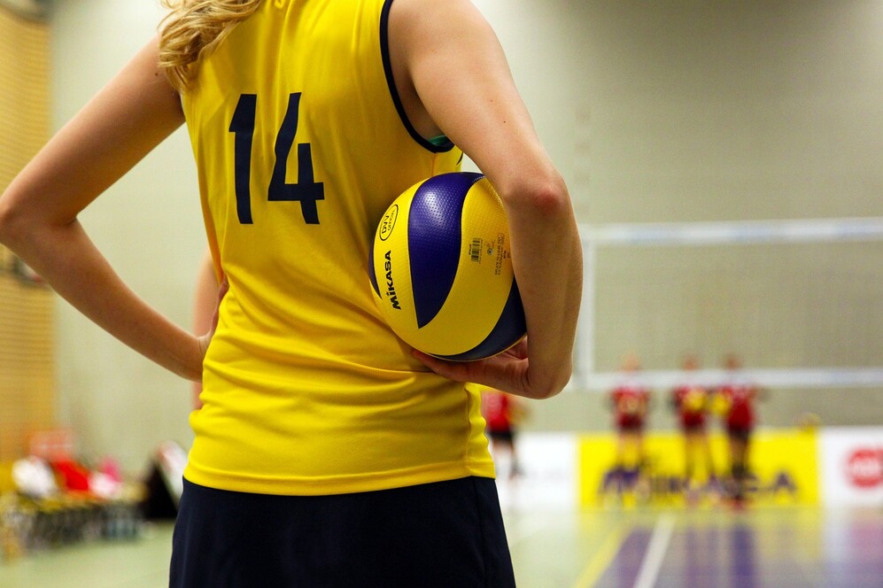 female volleyball player with ball